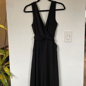 Black bodysuit open back wide legs waist straps